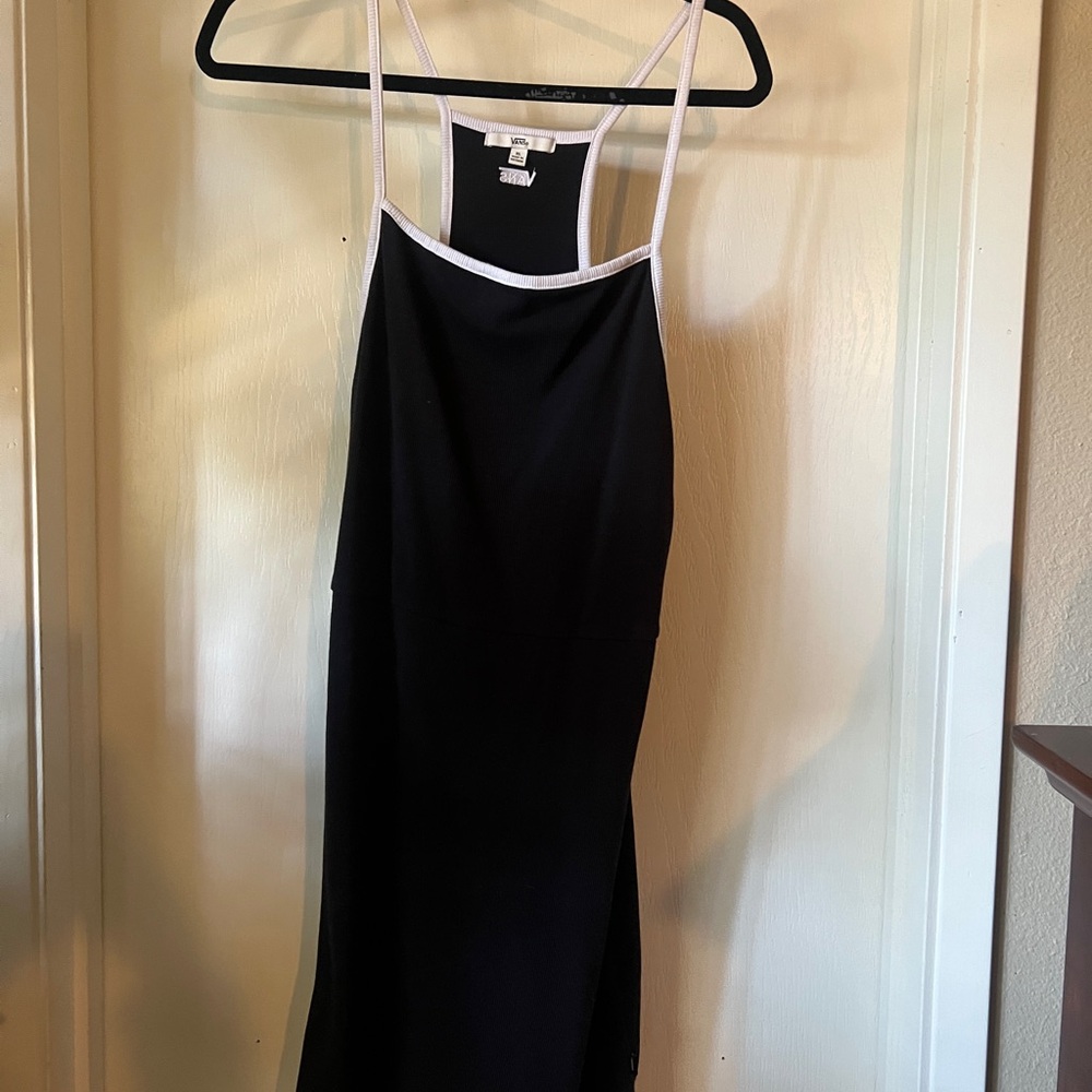 Elegant Black Dress with White Trim